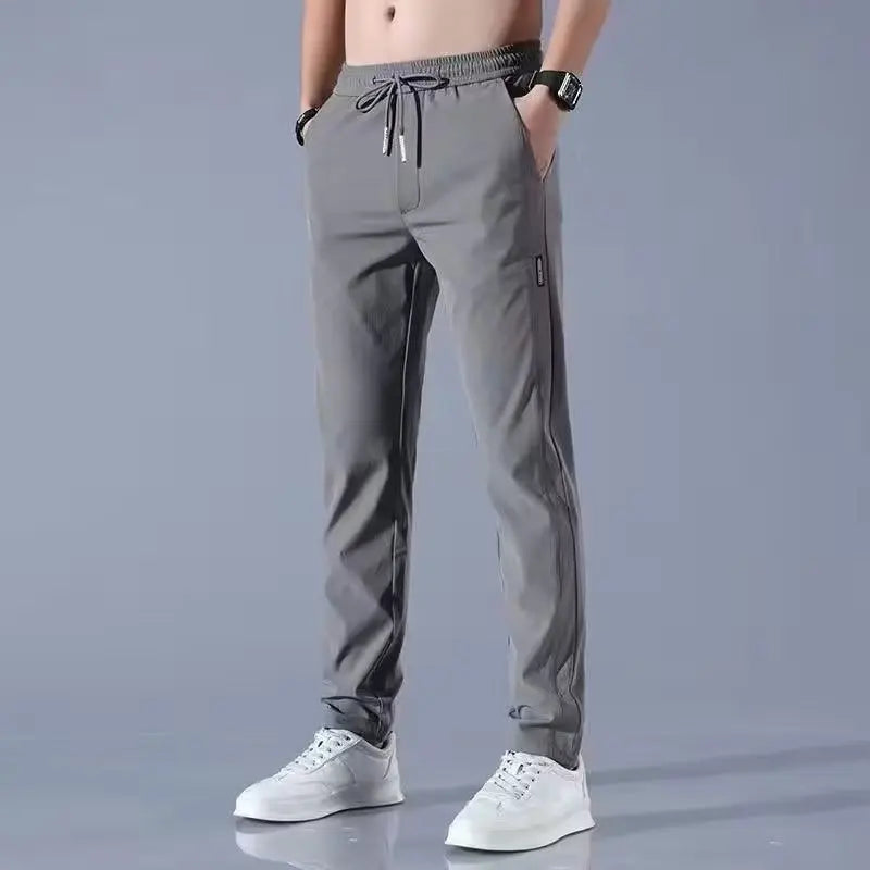 High end ice silk pants for men in summer, thin style, quick drying, large size, long pants for men in sports, casual